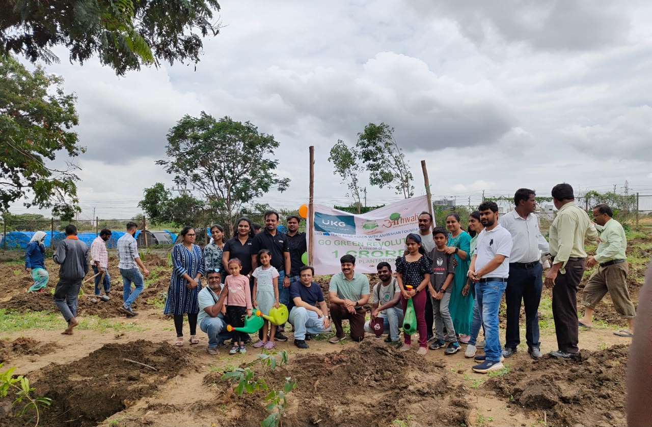Volunteers planting saplings